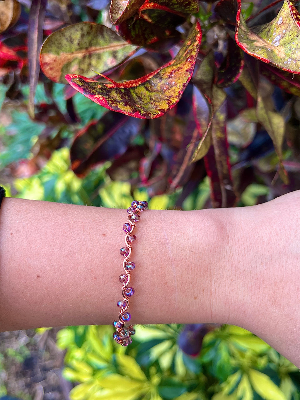 Copper bracelet with purple beads